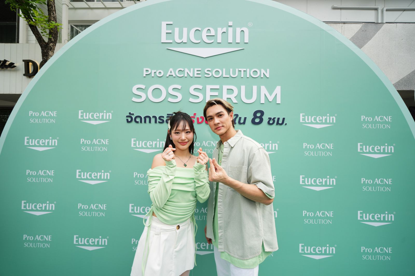A person and person posing for a pictureDescription automatically generated